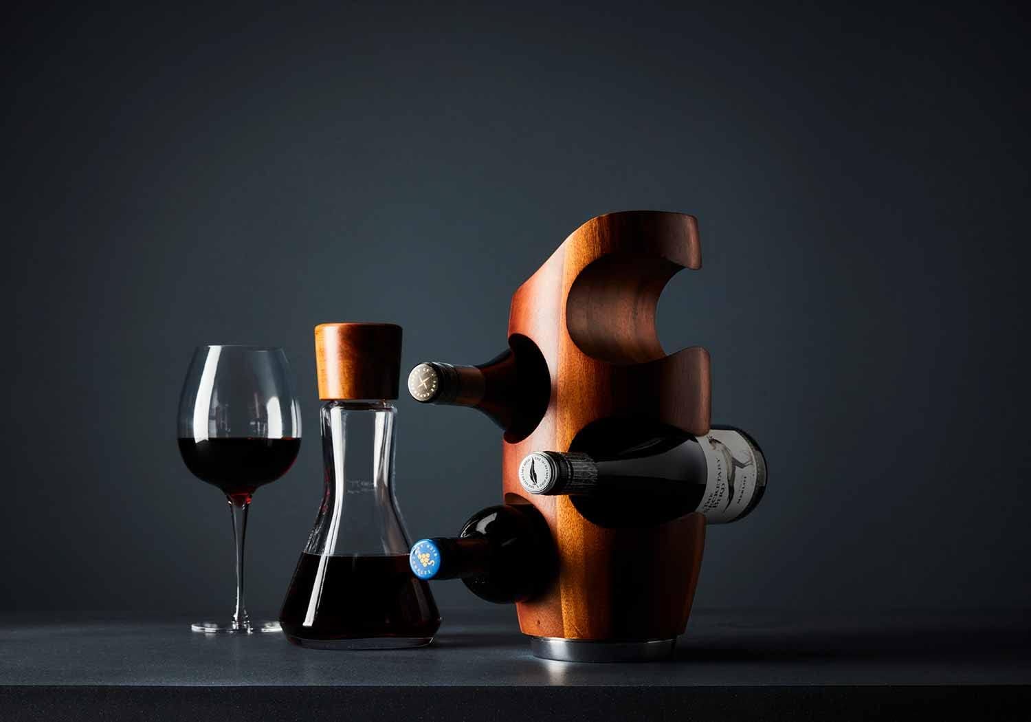 nambe Vie Wine Rack | Countertop Wine Rack 4 Bottle | Wine Bottle Holder for Bar Table and Wine Cabinet | Freestanding Wine Holder | Made of Nambé Alloy and Acacia Wood | 6” D x 13” H