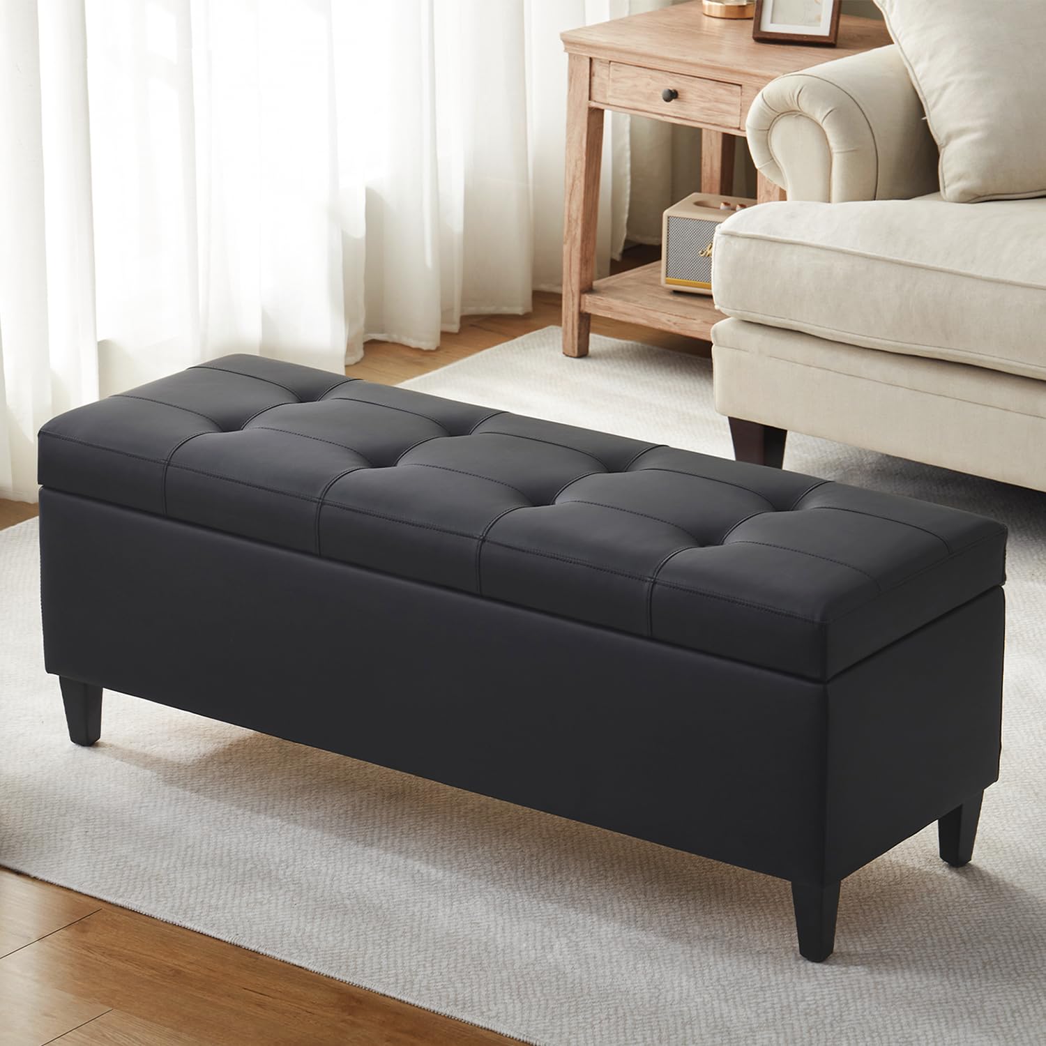 Womina 50.5 Inch Storage Ottoman Bench, Faux Leather Tufted Upholstered Bedroom Bench with Safety Hinges, Supports 300 lbs, Large Storage Bench for Living Room, Entryway (Black)