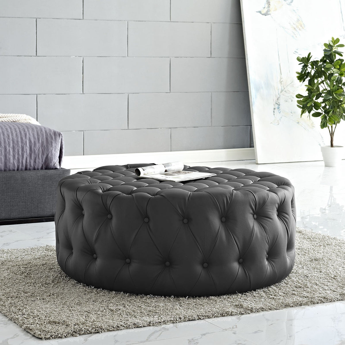 Round Tufted Faux Leather Ottoman